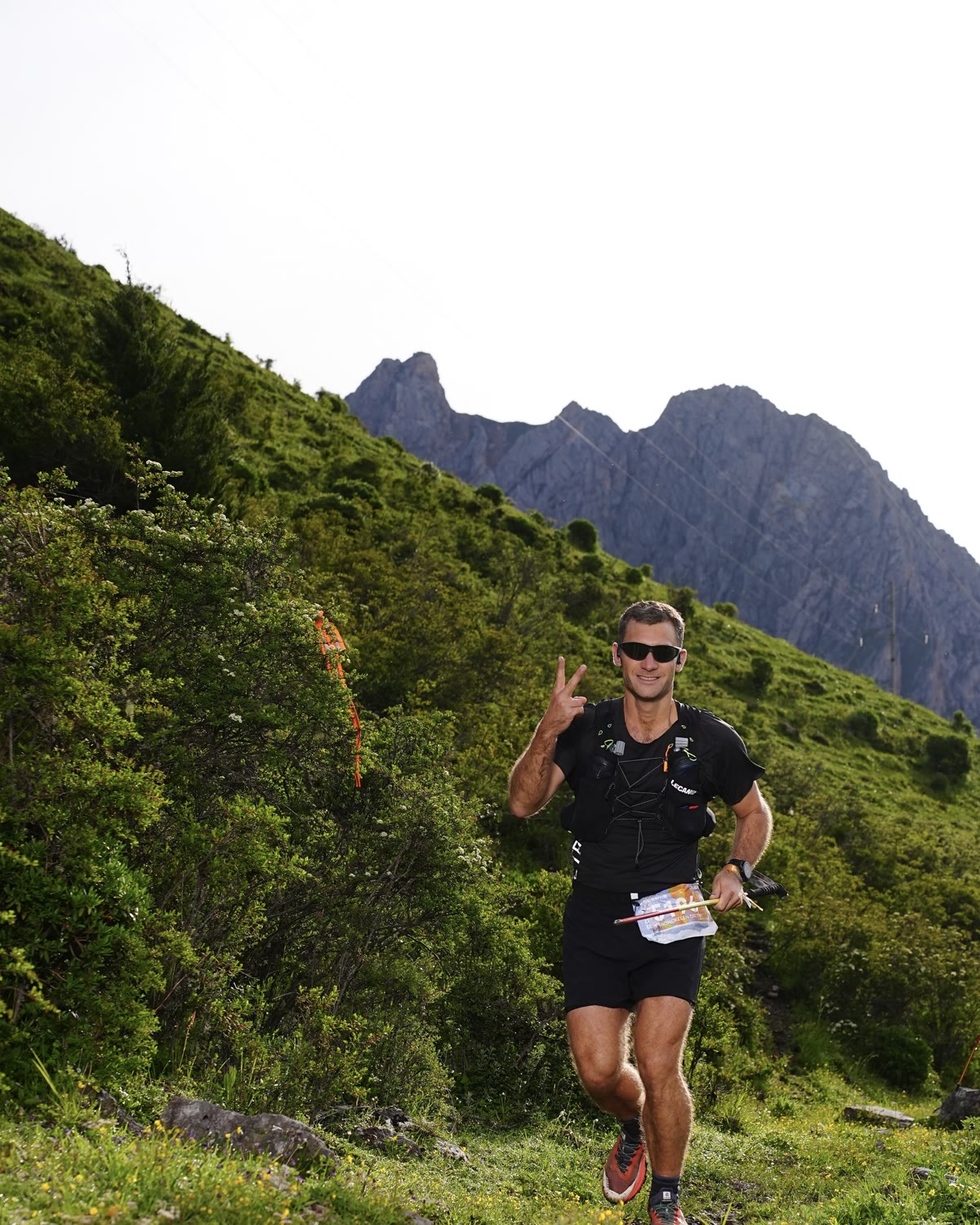 LECAMO runner on a high mountain trail